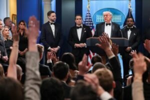 Trump says shooting won’t deter Iran war push