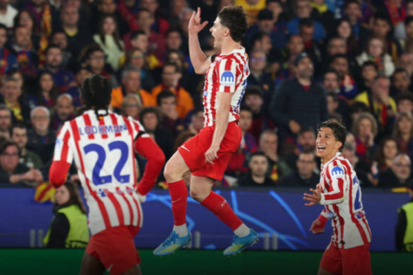 Atletico beats 10-man Barcelona 2-0 in Champions League