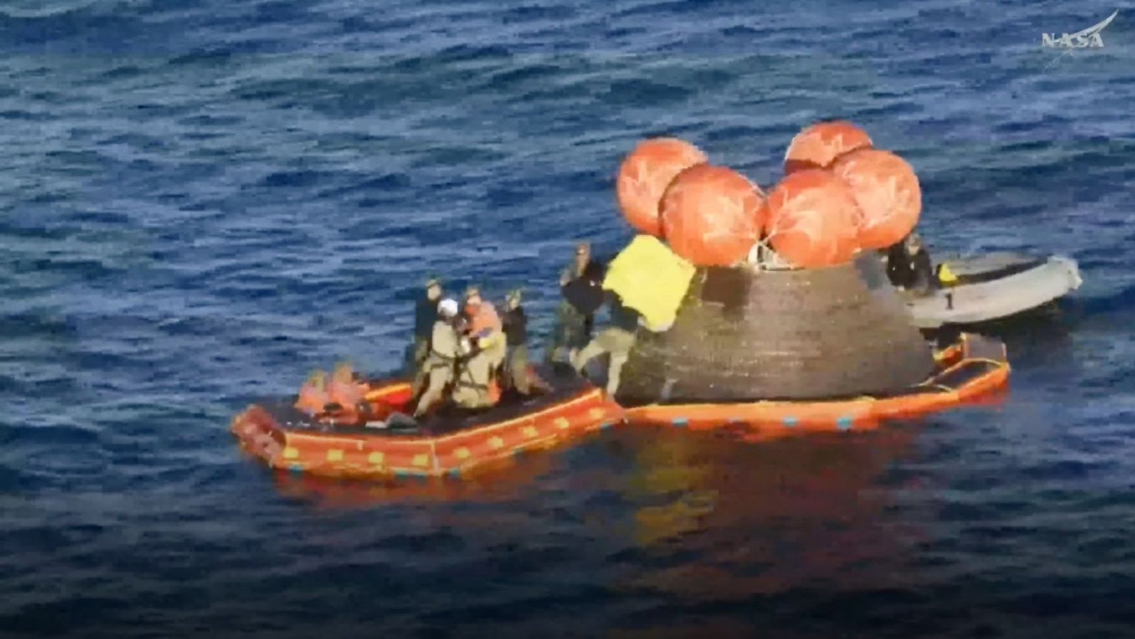 Artemis II astronauts return from moon splashdown