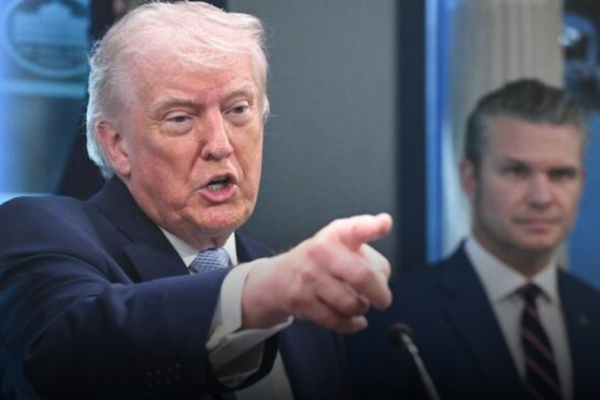 Trump Says US Military to Stay Near Iran Warns